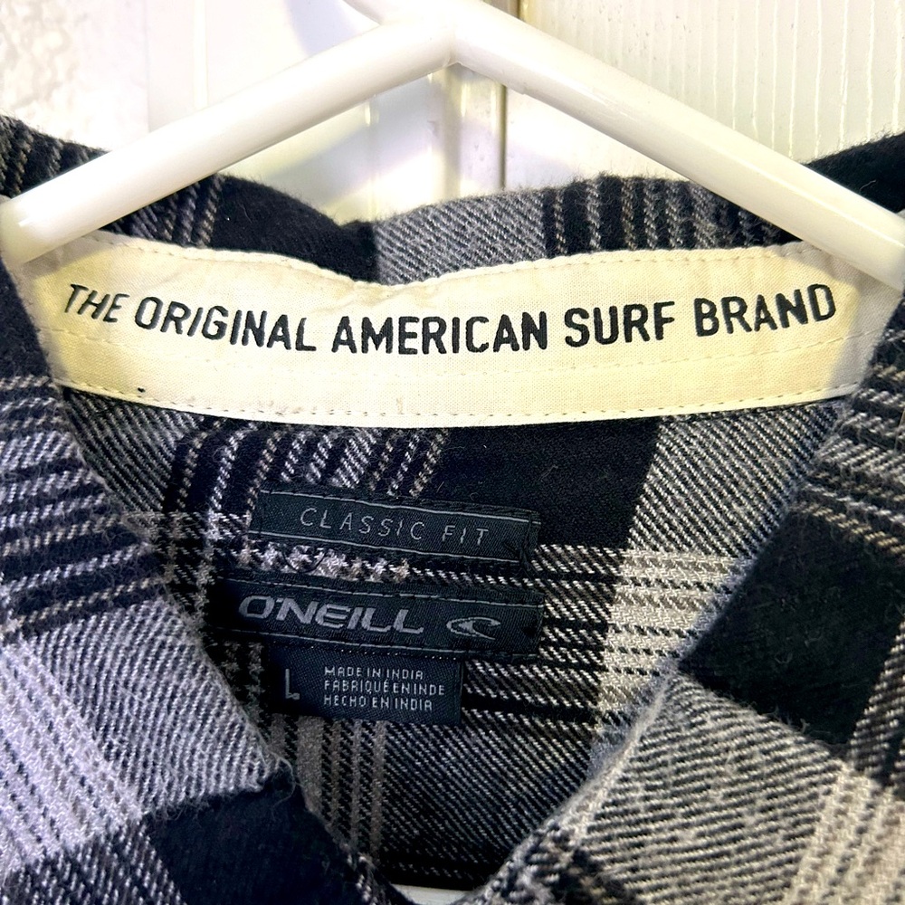 Large O’Neil Black and White Fleece Flannel.